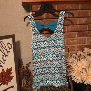 NWT Rue 21 Flowy tank top. Multicolored with teal bow in the back.